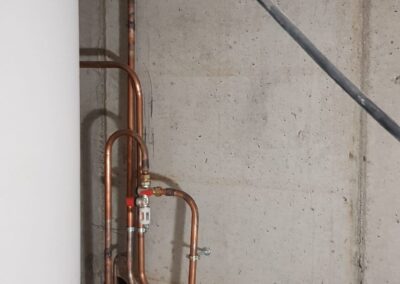 Éléments de plomberie intégrés dans un bâtiment
